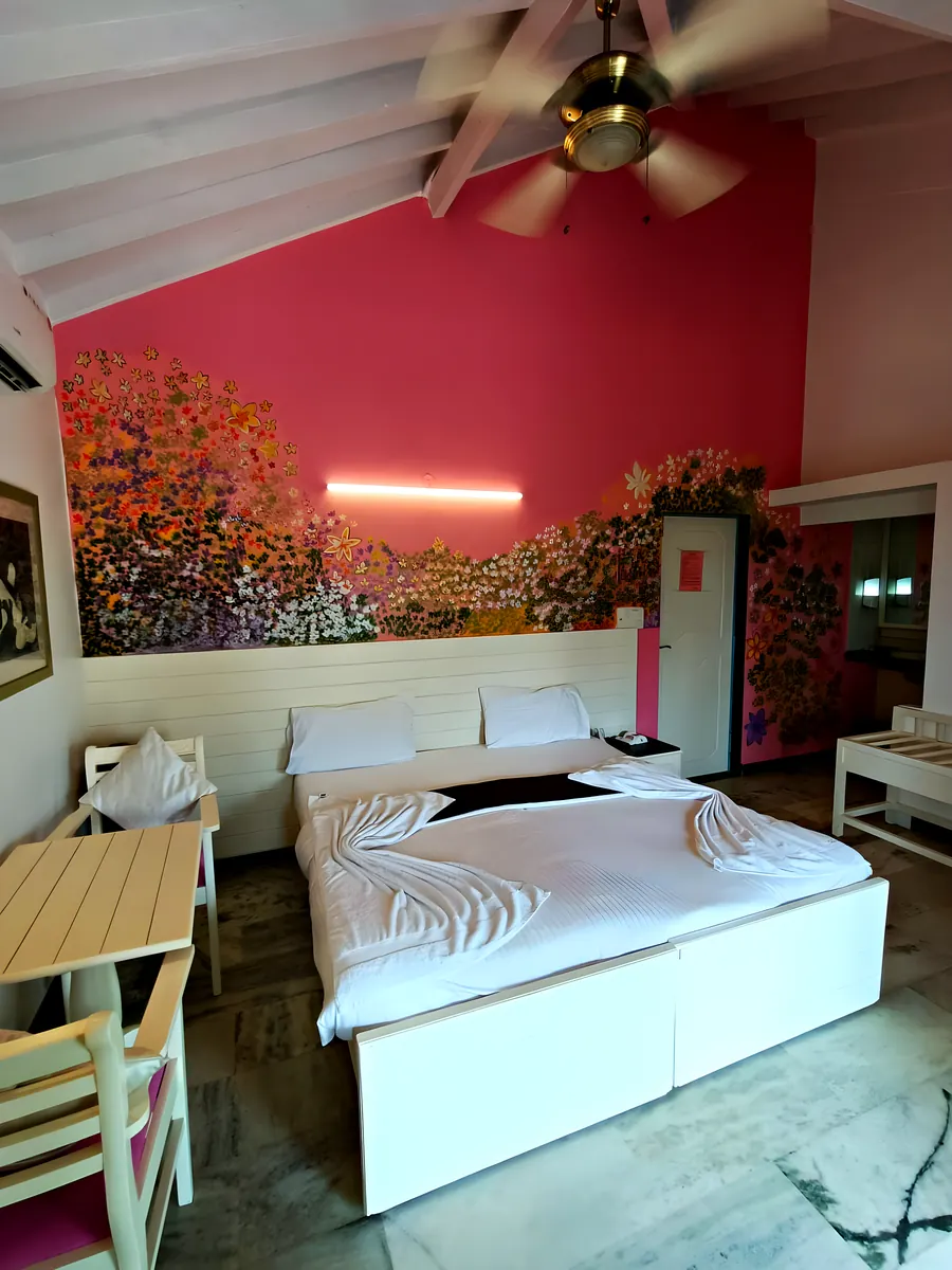 The painted room: the bed and the painted wall